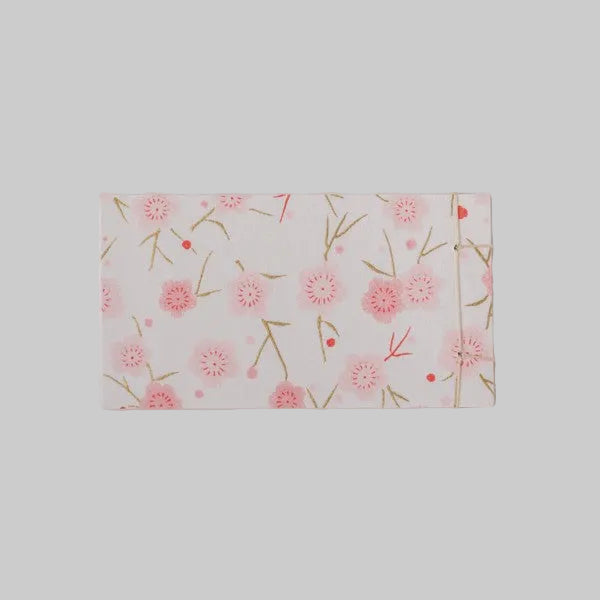 Small Japanese hand-bound memo pad with a pink floral design on Yuzen washi paper