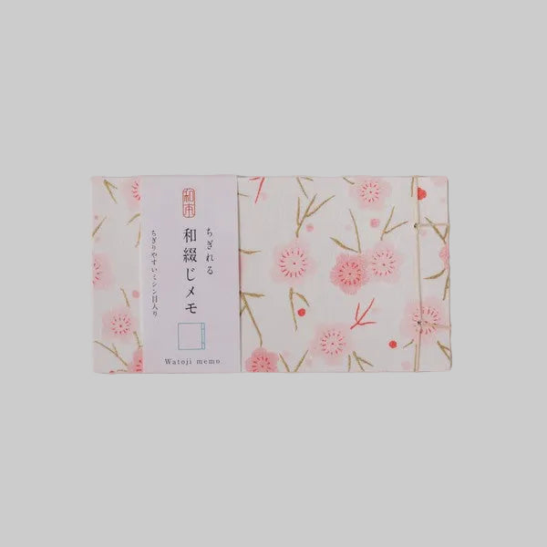 Small Japanese hand-bound memo pad with a pink floral design on Yuzen washi paper