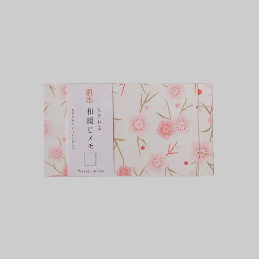 Small Japanese hand-bound memo pad with a pink floral design on Yuzen washi paper